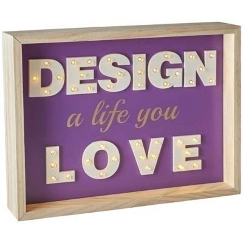 3D LED illuminated purple sign quoting Design a life you love designed by Transomnia